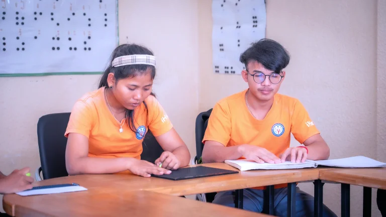 Students learning Khmer literacy and Braille reading at DYP Learning Center in Cambodia