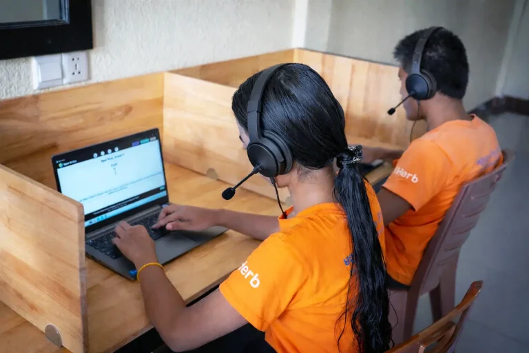 Students using screen reader software with headsets during assistive technology training at DYP Learning