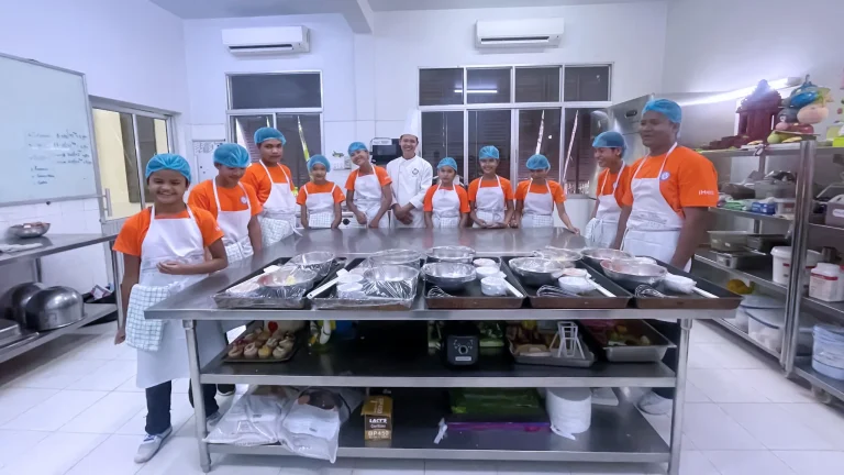 Visually impaired students participating in a hospitality training workshop with chefs at EHT through the Discover Your Possibilities (DYP) collaboration in Siem Reap, Cambodia.